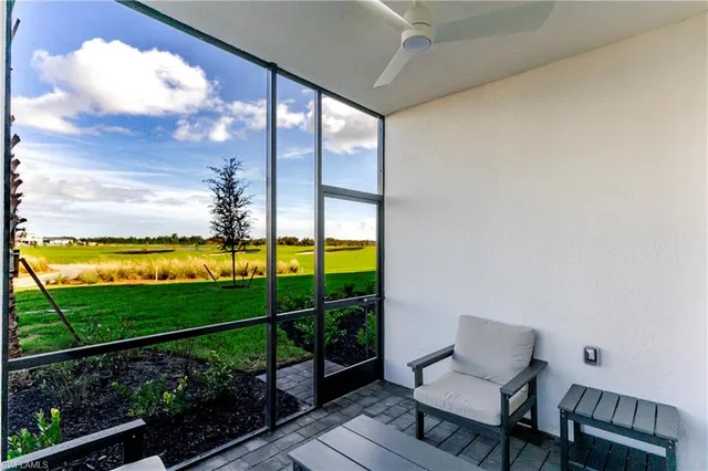 a view of a porch and chairs