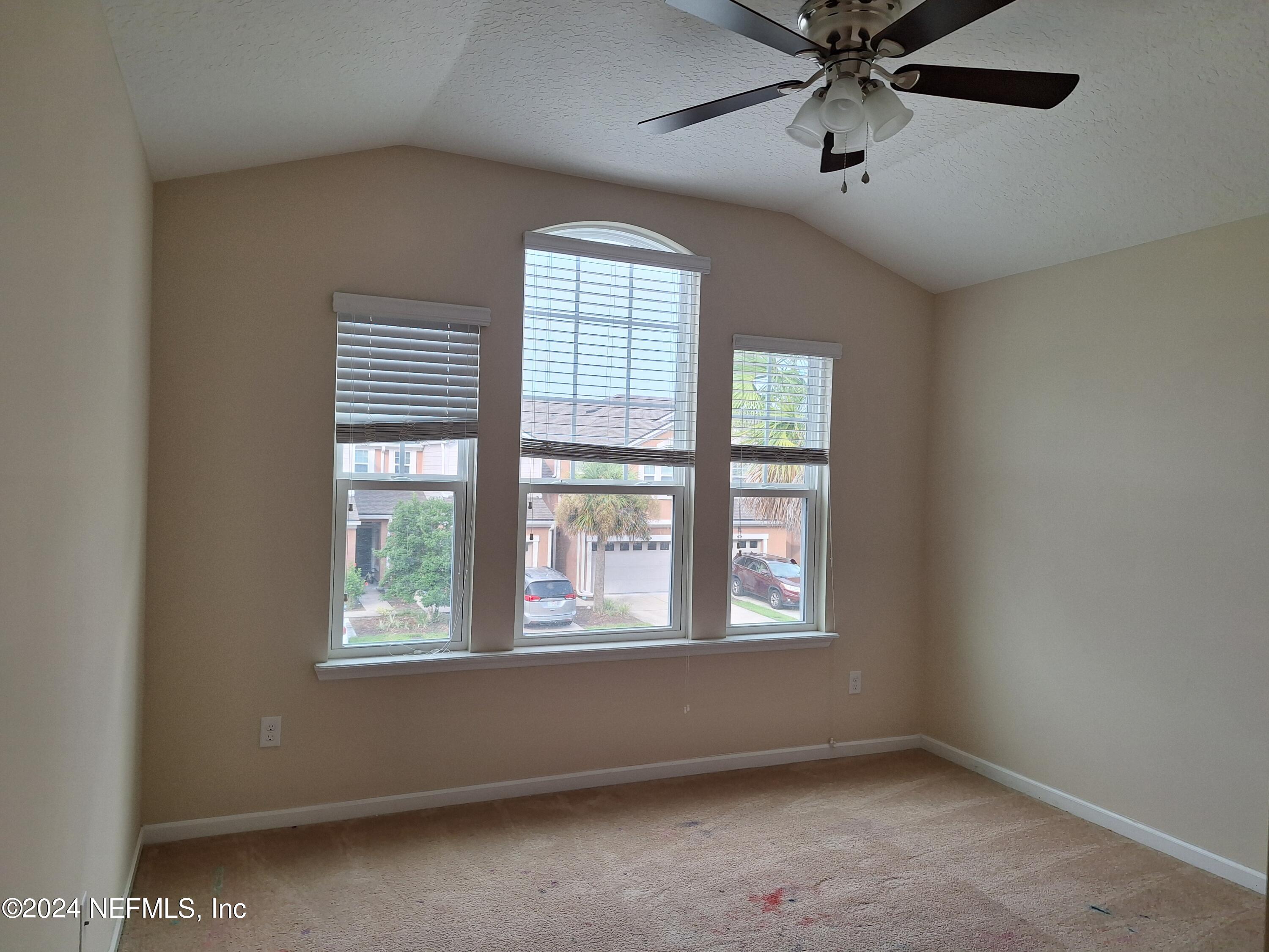 177 Richmond Drive St. Johns, FL 32259 - Photo 12 of 29 an empty room with a window