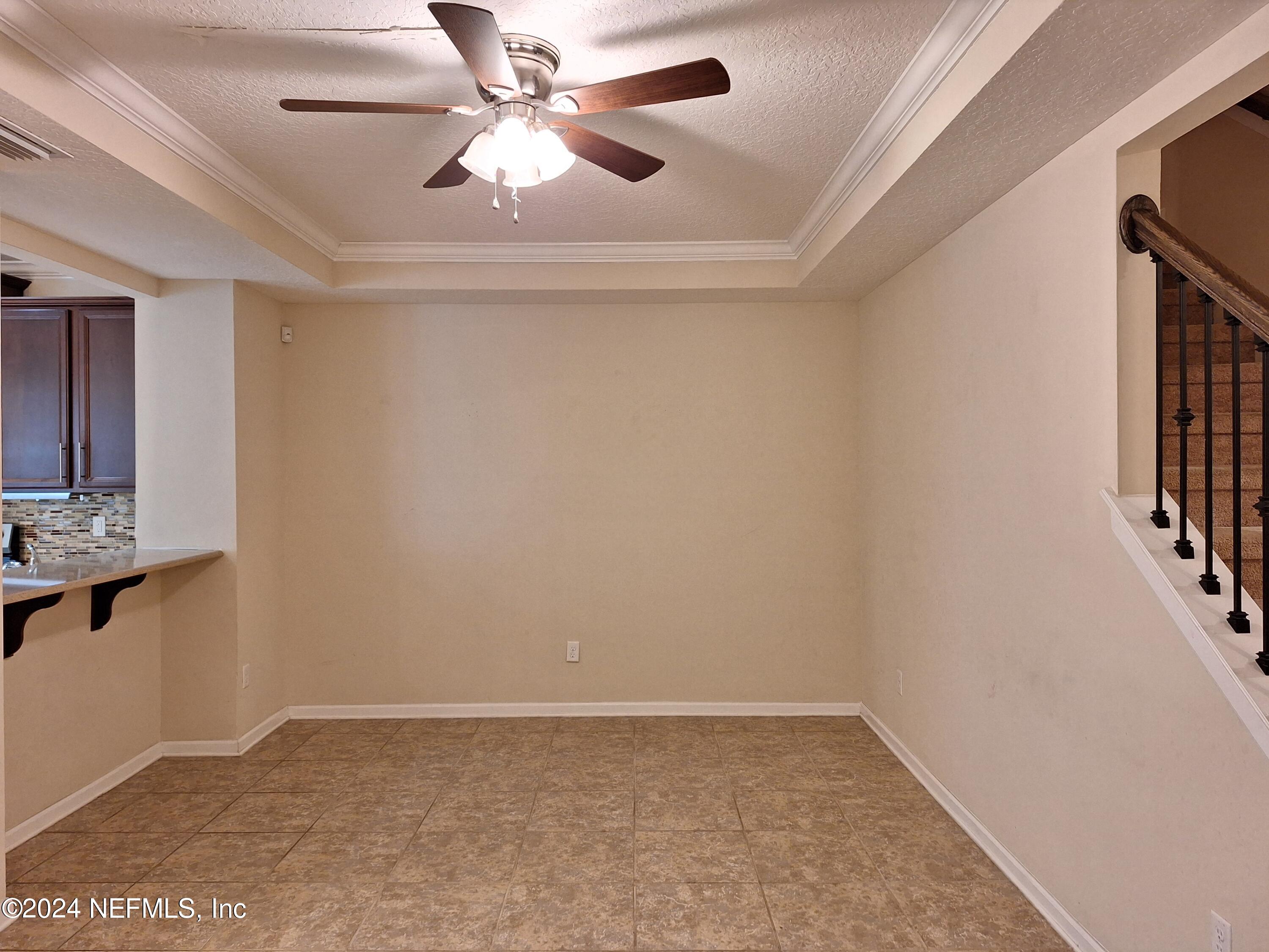 177 Richmond Drive St. Johns, FL 32259 - Photo 5 of 29 wooden floor in an empty room with a window