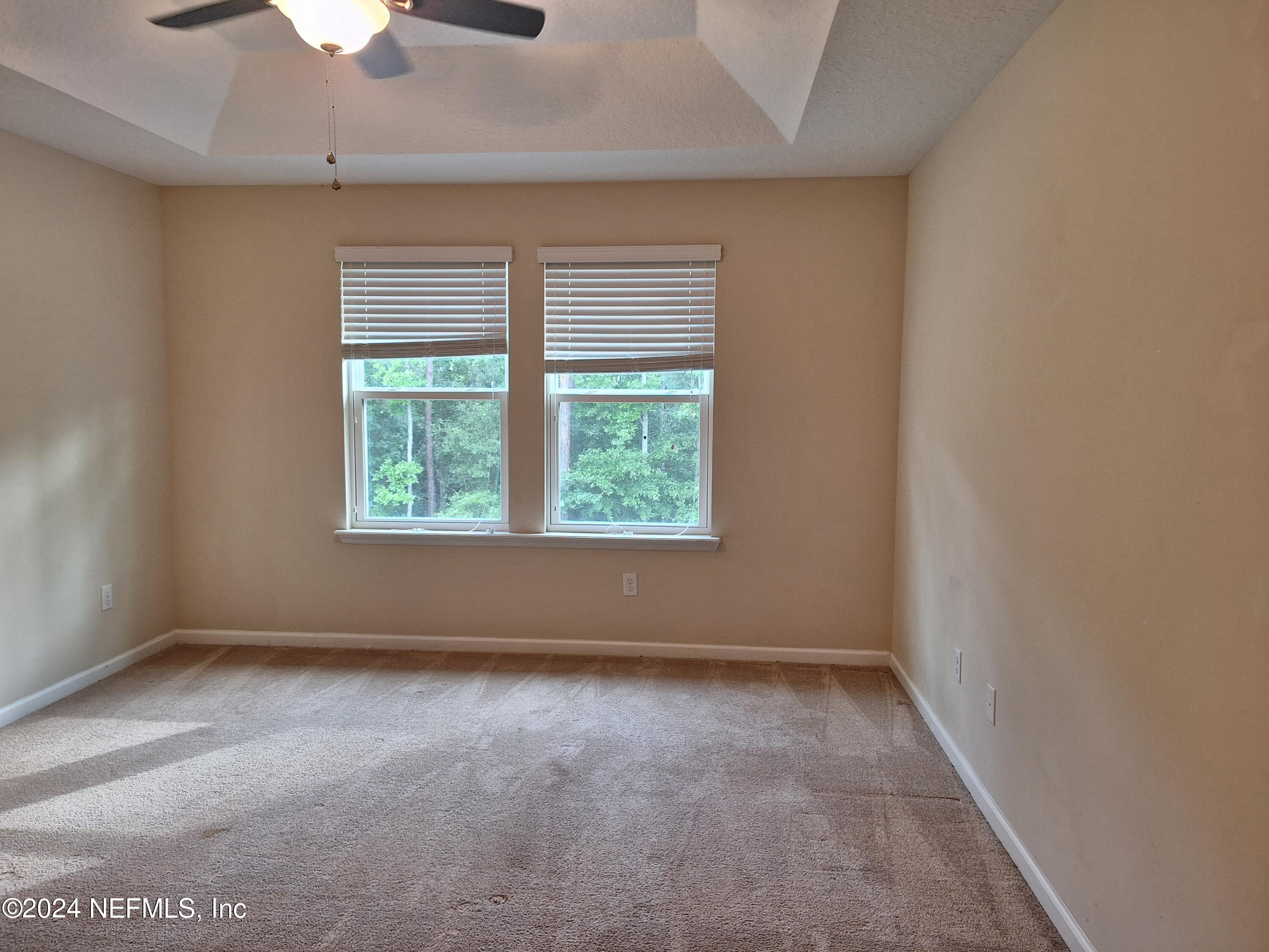 177 Richmond Drive St. Johns, FL 32259 - Photo 9 of 29 an empty room with a window