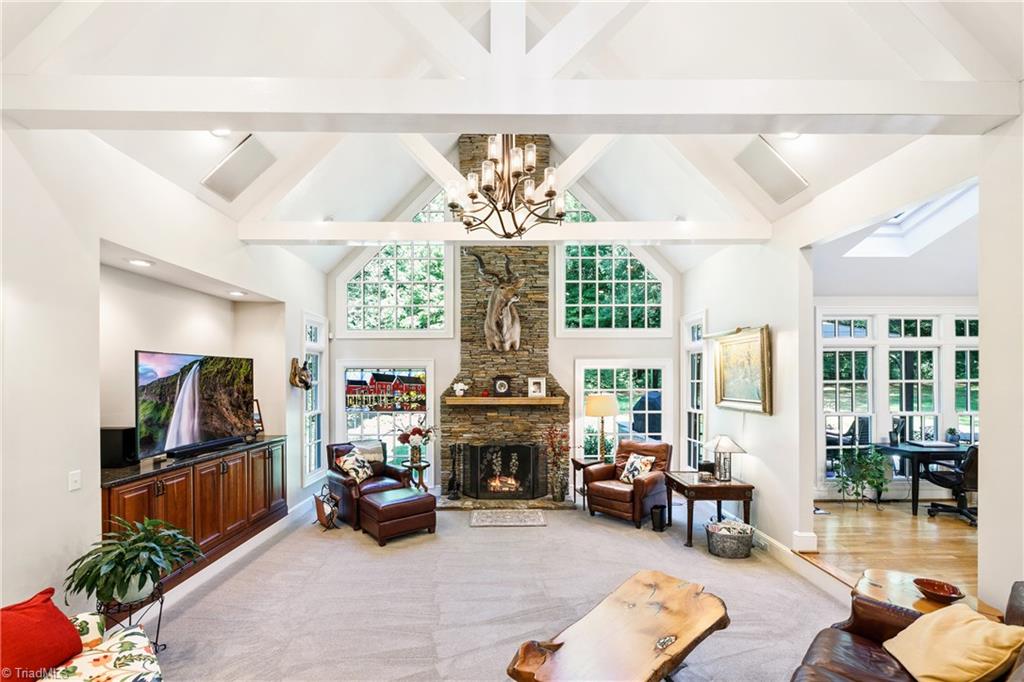 3920 Beechridge Road Winston-Salem, NC 27106 - Photo 13 of 30 Beams and stacked stone fireplace truly make a statement