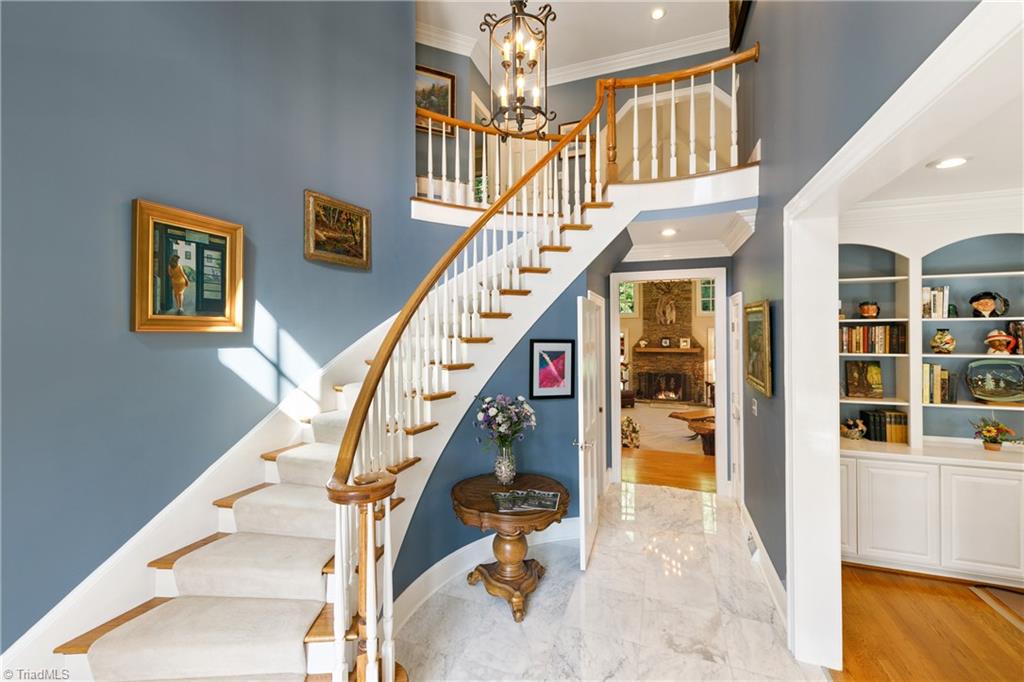 3920 Beechridge Road Winston-Salem, NC 27106 - Photo 4 of 30 Beautiful curved stairway and marble tile flooring