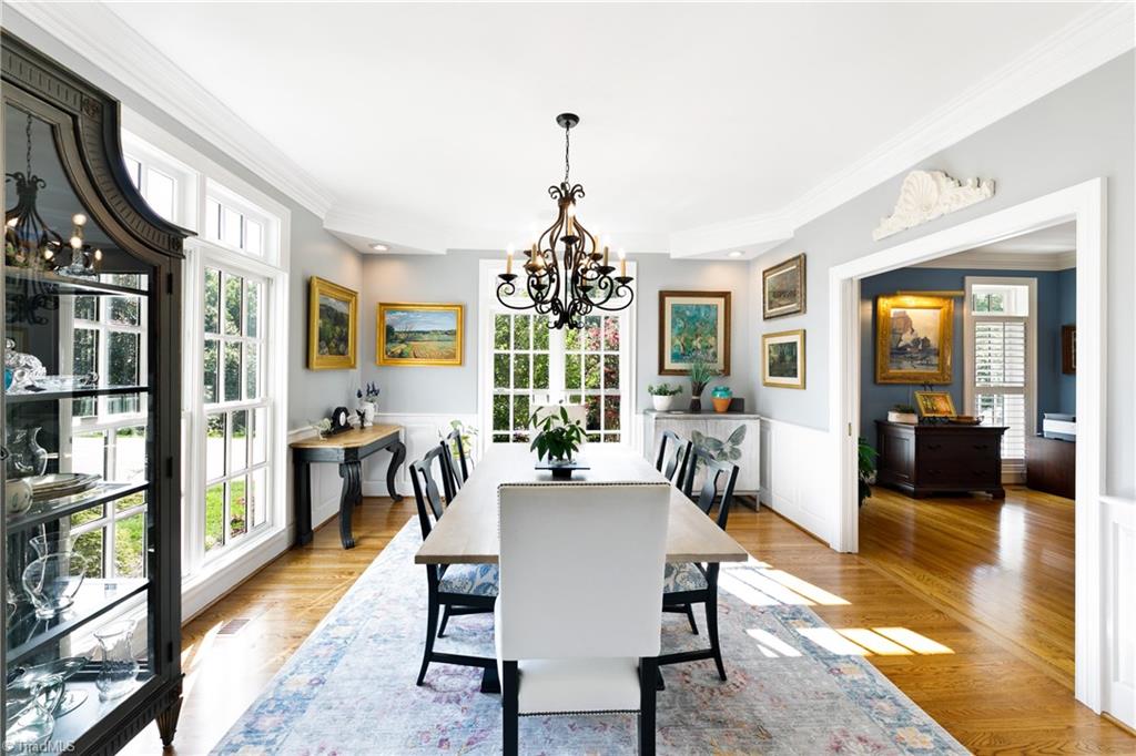 3920 Beechridge Road Winston-Salem, NC 27106 - Photo 6 of 30 Light-filled dining room with grey paint and wainscoting