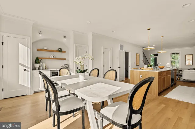 a view of a hallway with washer and dryer