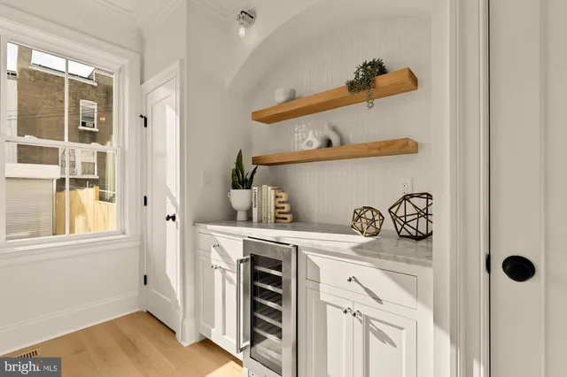 a bed room with a bed and a window