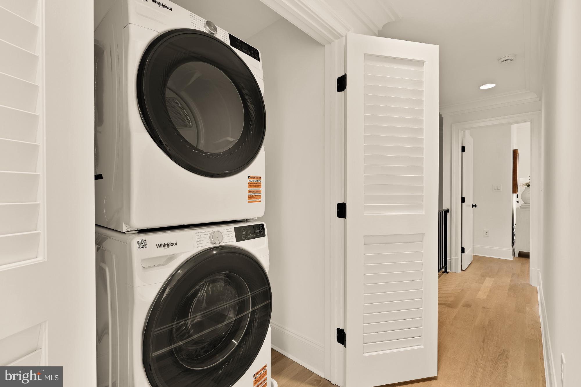 4830 8th Street Northwest Washington, DC 20011 - Photo 24 of 54 a view of a hallway with washer and dryer