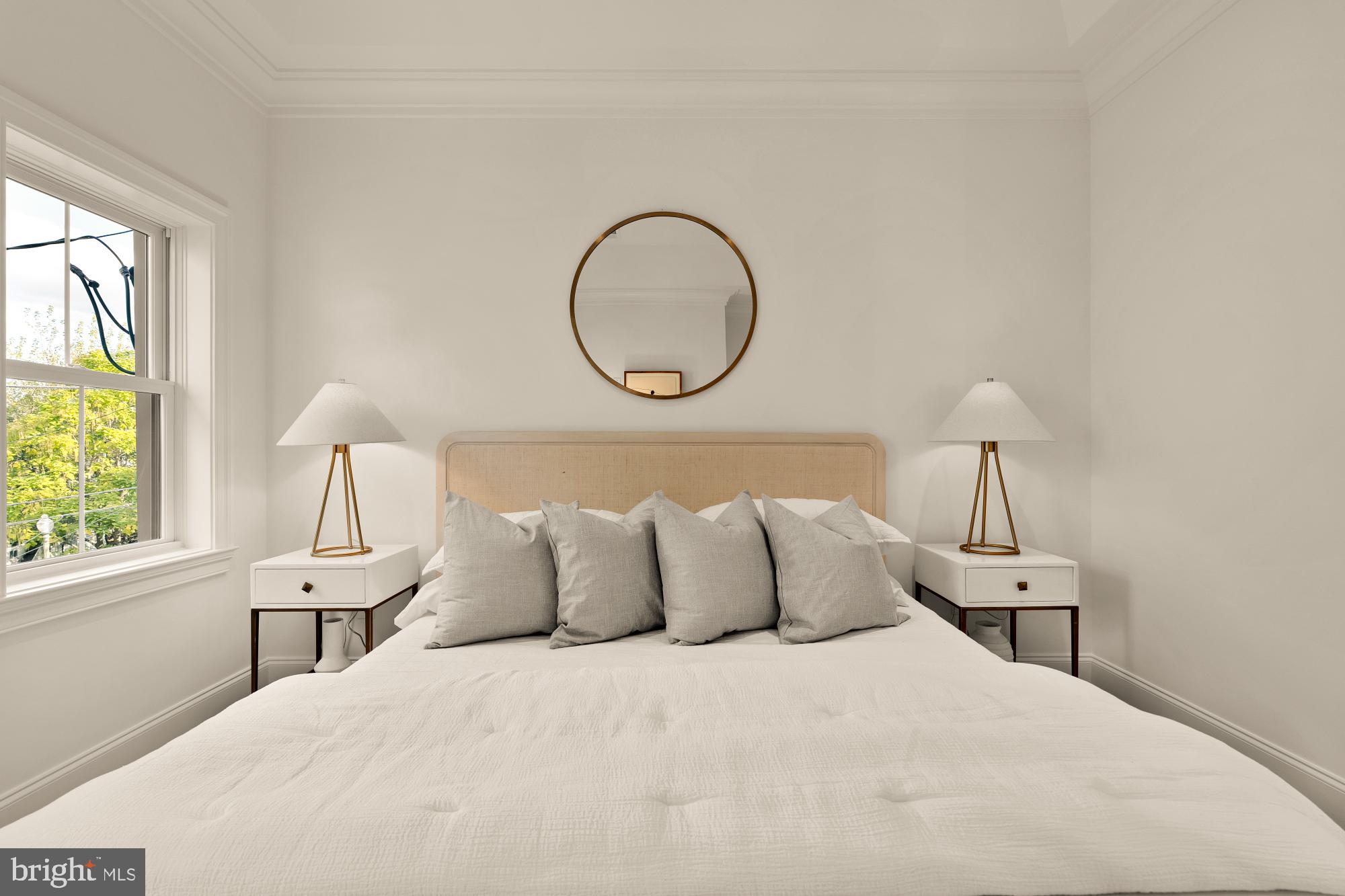 4830 8th Street Northwest Washington, DC 20011 - Photo 26 of 54 a bedroom with a bed and a window