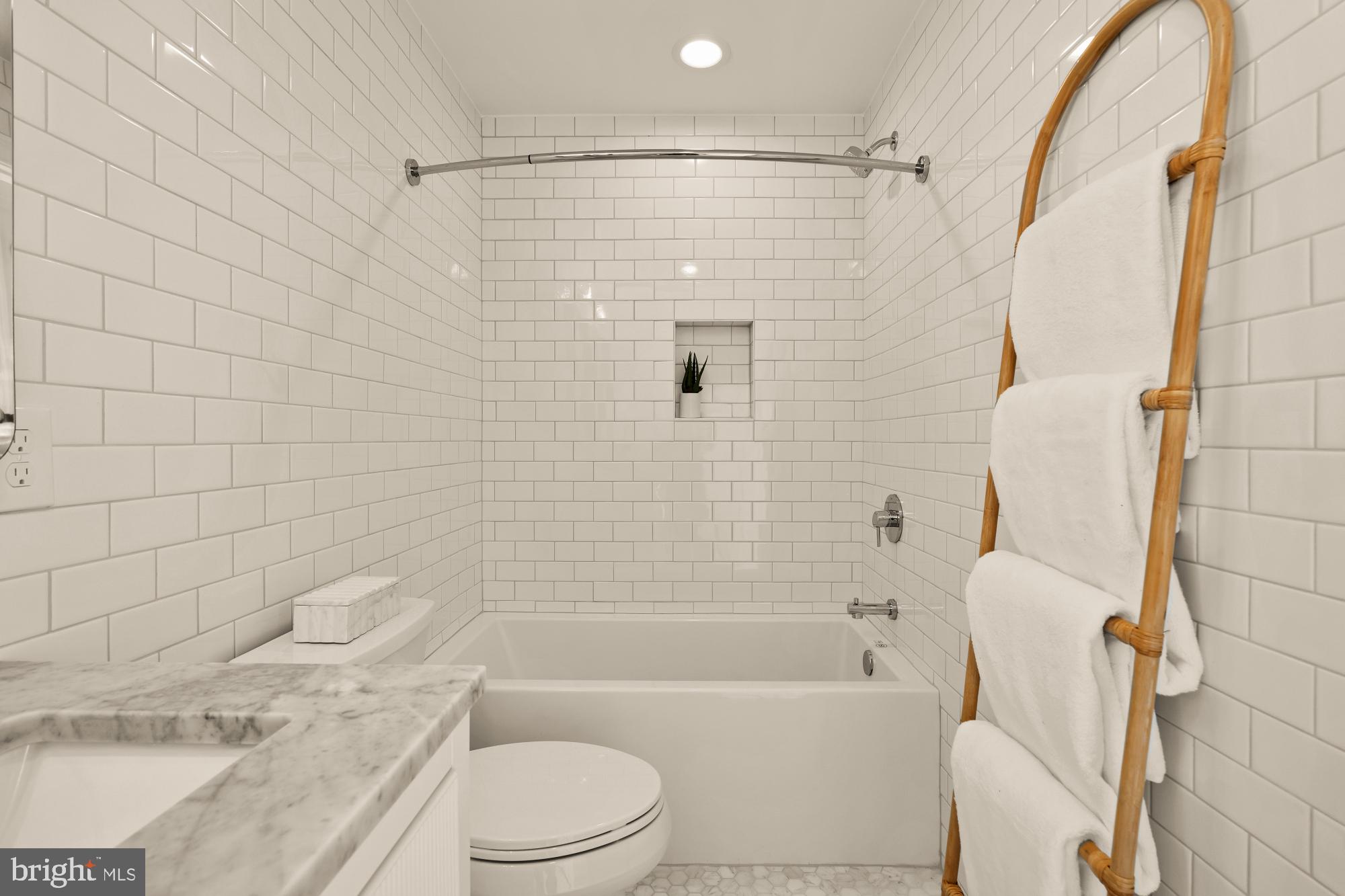 4830 8th Street Northwest Washington, DC 20011 - Photo 34 of 54 a bathroom with a toilet and a bathtub