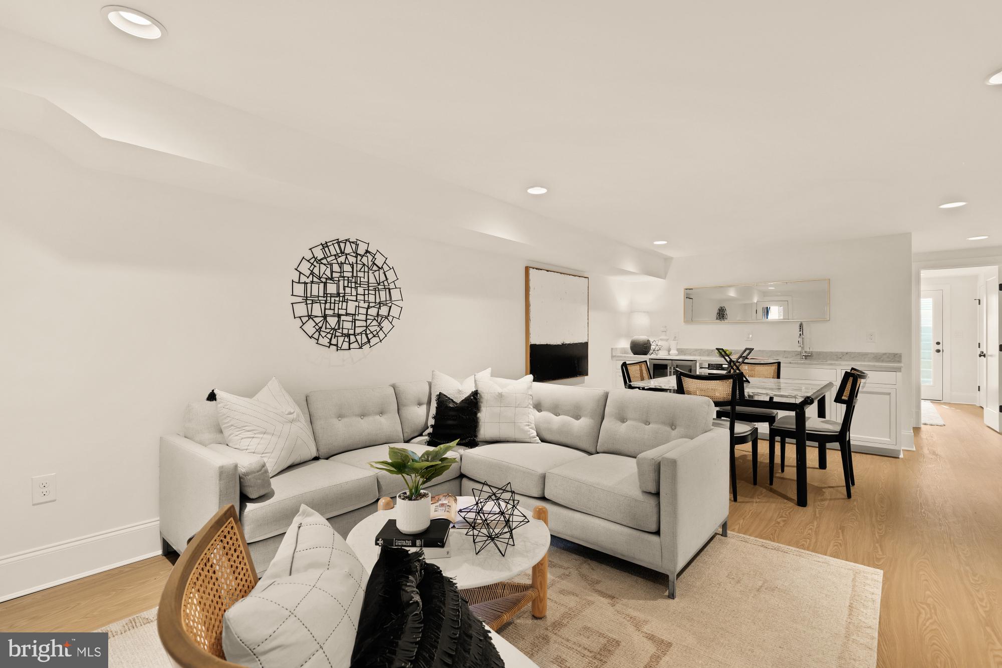 4830 8th Street Northwest Washington, DC 20011 - Photo 38 of 54 a living room with furniture and a large window