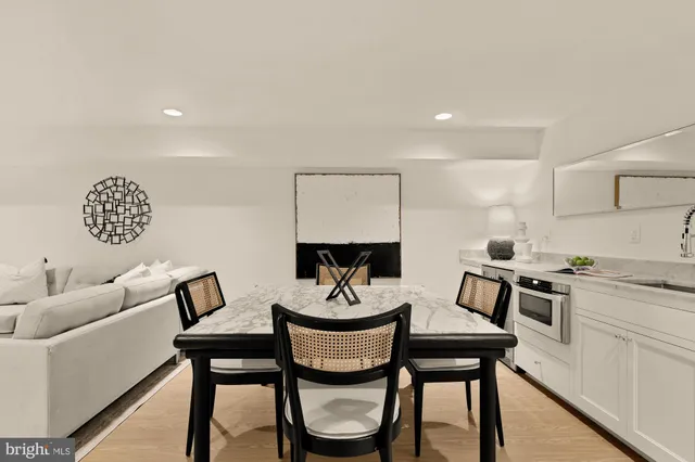 a kitchen with a stove and a refrigerator