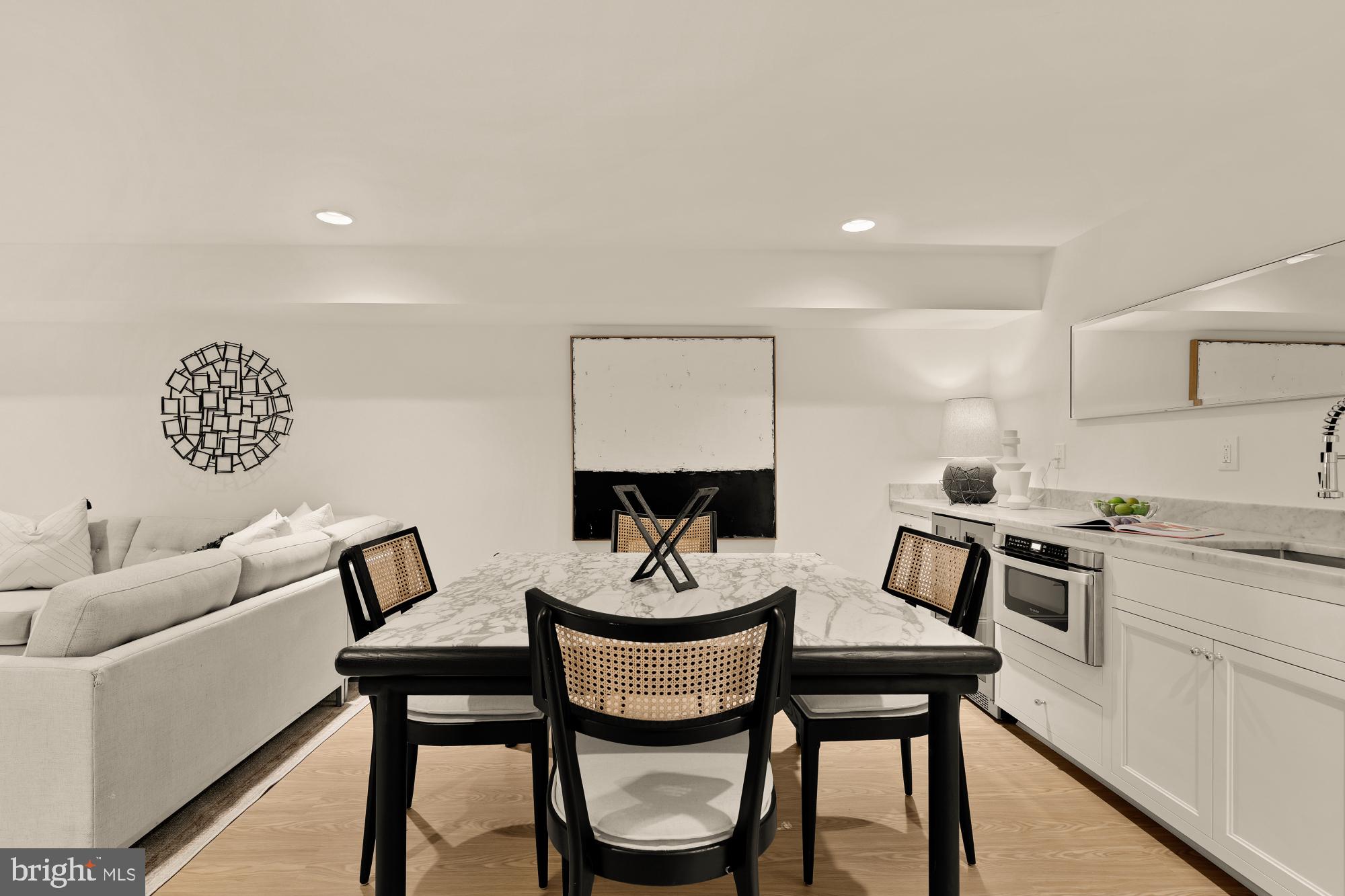 4830 8th Street Northwest Washington, DC 20011 - Photo 41 of 54 a view of a dining room with furniture and wooden floor