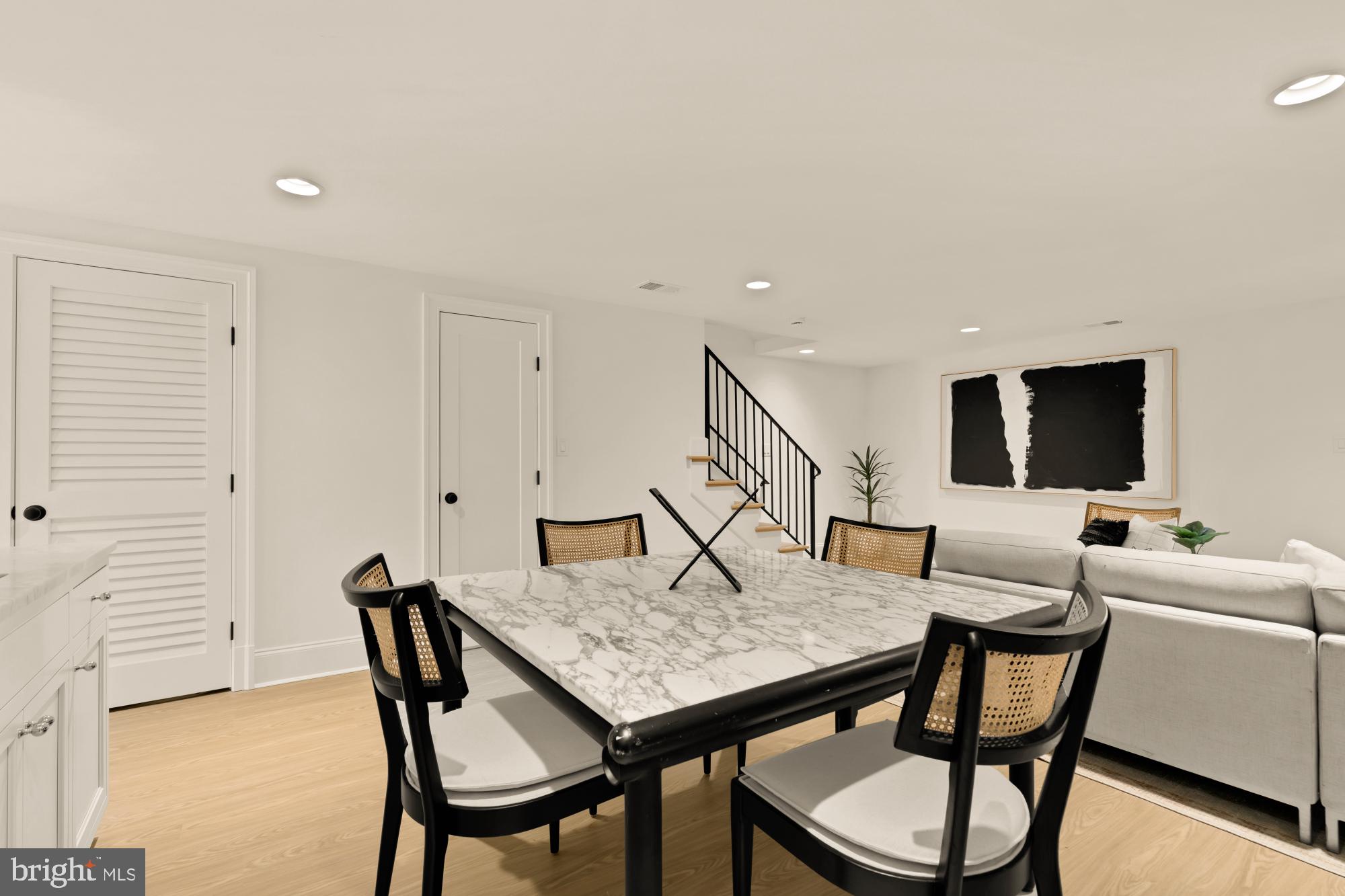 4830 8th Street Northwest Washington, DC 20011 - Photo 42 of 54 a view of a livingroom with furniture and a flat screen tv