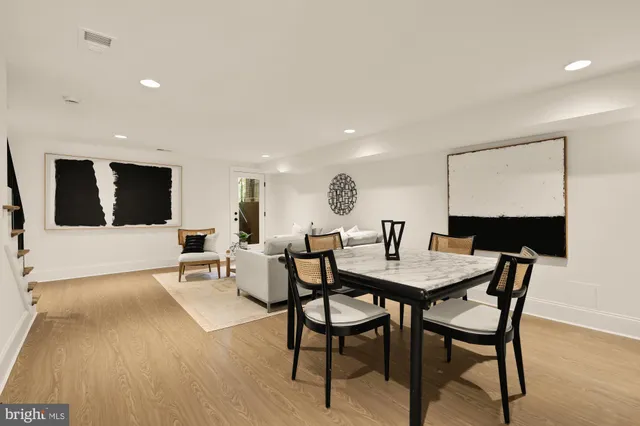a bathroom with a shower and a sink