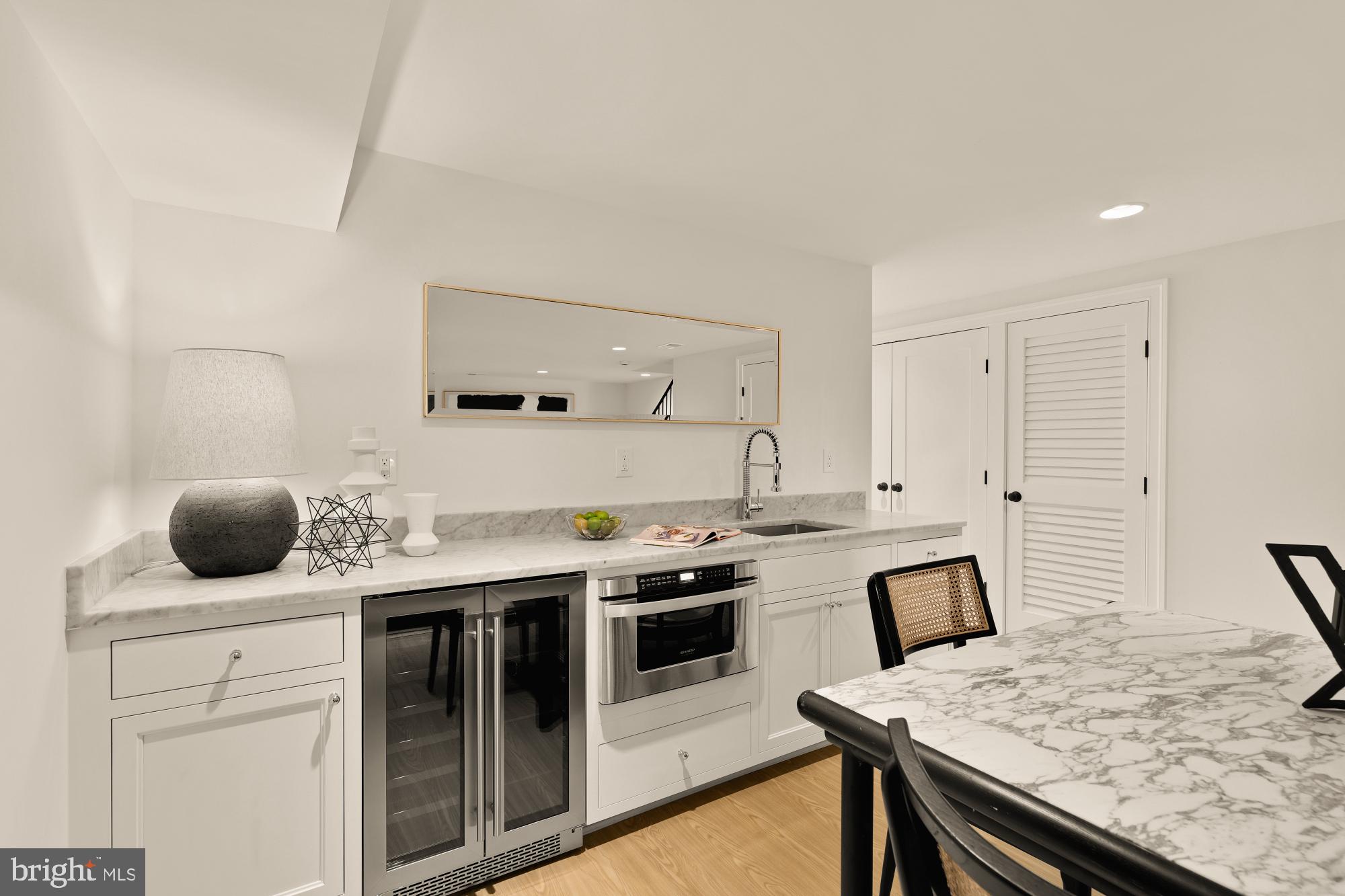 4830 8th Street Northwest Washington, DC 20011 - Photo 45 of 54 a kitchen with a stove and a refrigerator