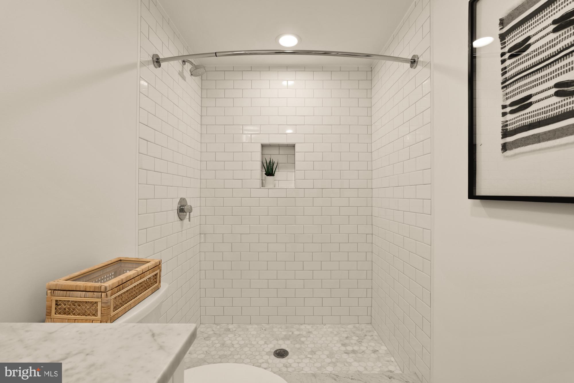 4830 8th Street Northwest Washington, DC 20011 - Photo 47 of 54 a bathroom with a shower and a sink