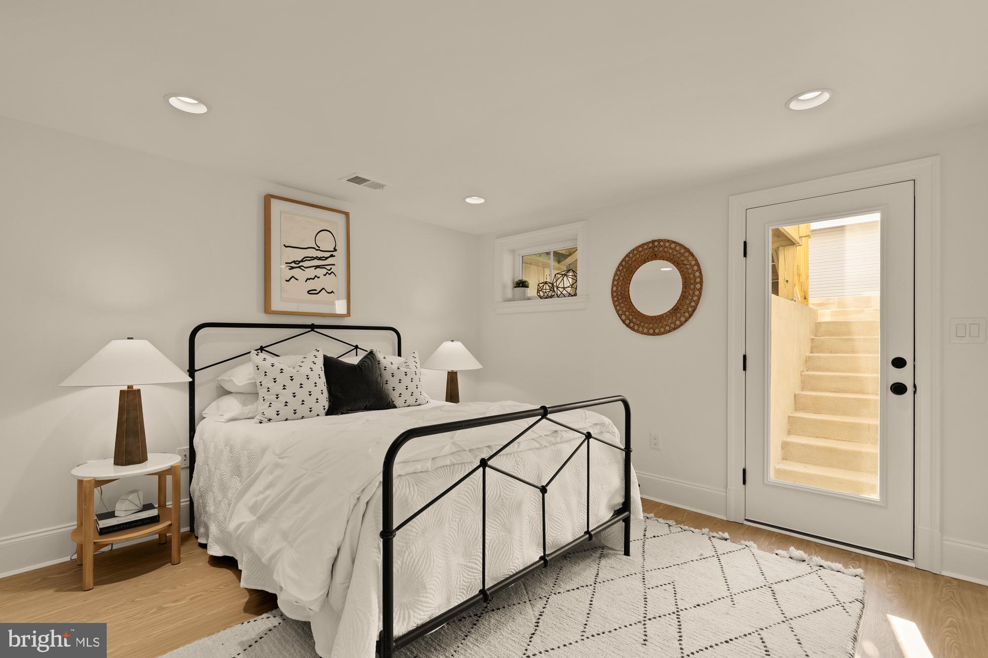 4830 8th Street Northwest Washington, DC 20011 - Photo 48 of 54 a bedroom with a bed and a window