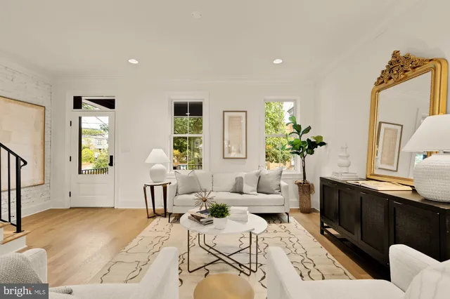 a kitchen with a table and chairs