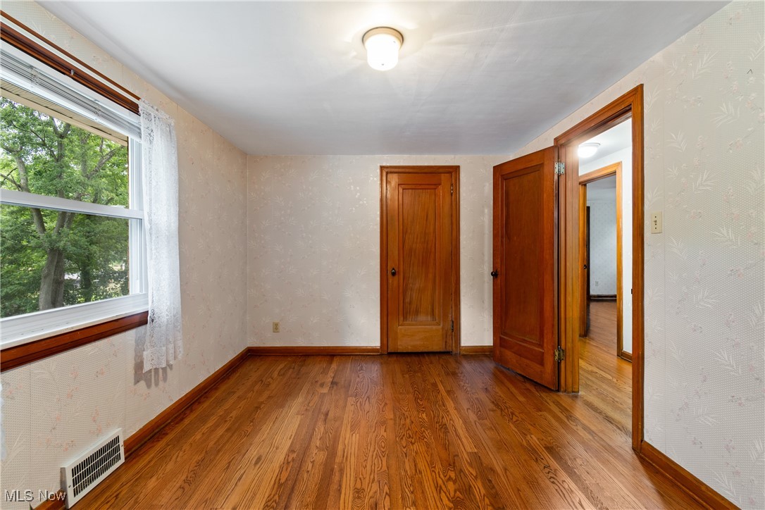 3550 Manchester Road Akron, OH 44319 - Photo 21 of 40 Unfurnished bedroom with hardwood / wood-style flooring