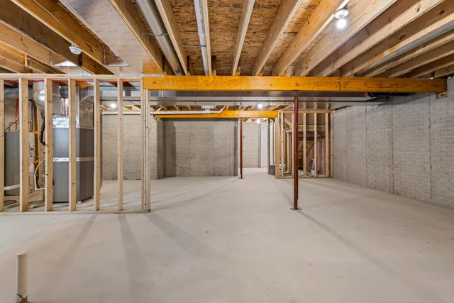 a view of a room with wooden walls