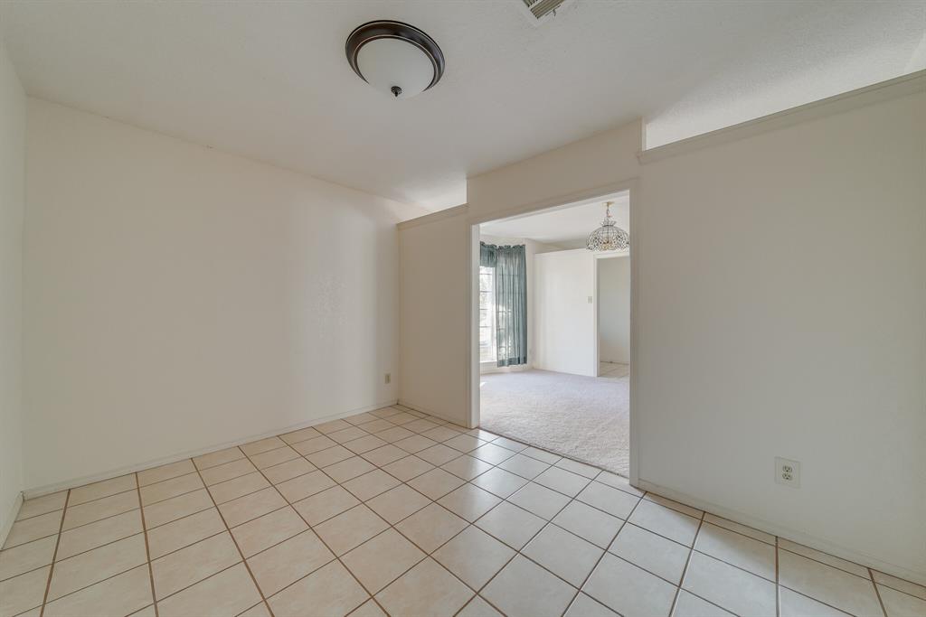 1963 East Dove Road Southlake, TX 76092 - Photo 12 of 27 a view of a room that has a window in it