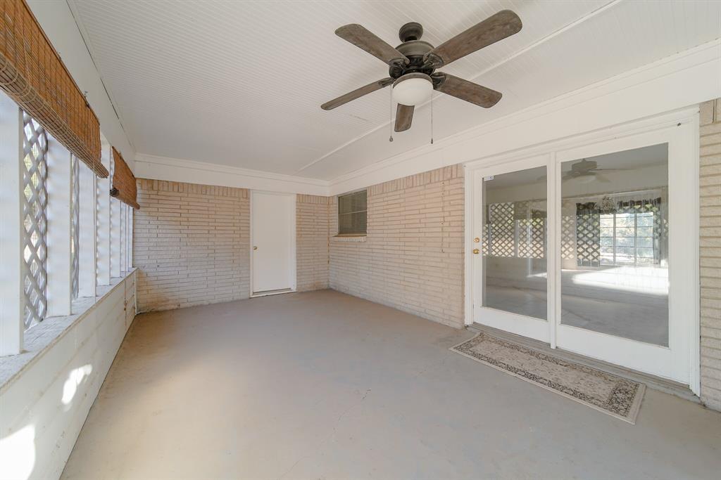 1963 East Dove Road Southlake, TX 76092 - Photo 21 of 27 a view of a livingroom with a ceiling fan and window