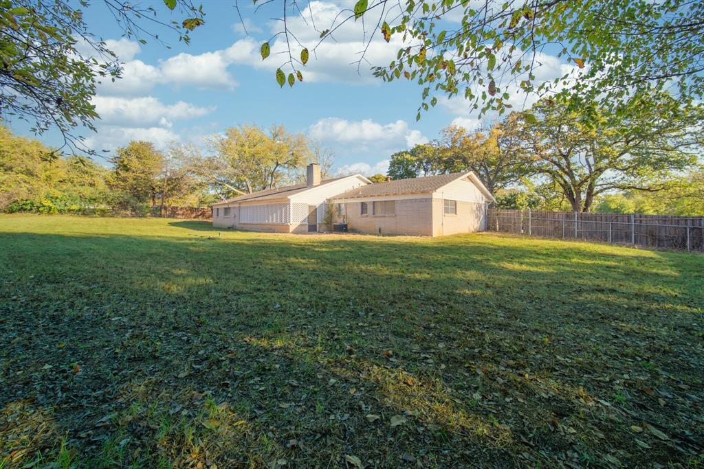 1963 East Dove Road Southlake, TX 76092 - Photo 23 of 27 a view of a house with a big yard
