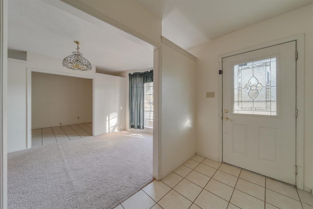 1963 East Dove Road Southlake, TX 76092 - Photo 4 of 27 a view of an empty room and window
