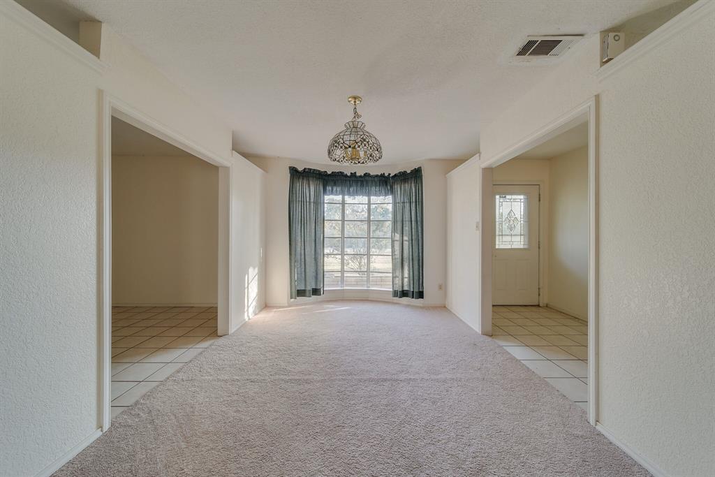 1963 East Dove Road Southlake, TX 76092 - Photo 8 of 27 a view of an empty room with a window