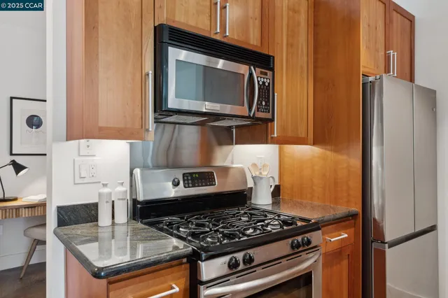 a kitchen with a stove and a microwave