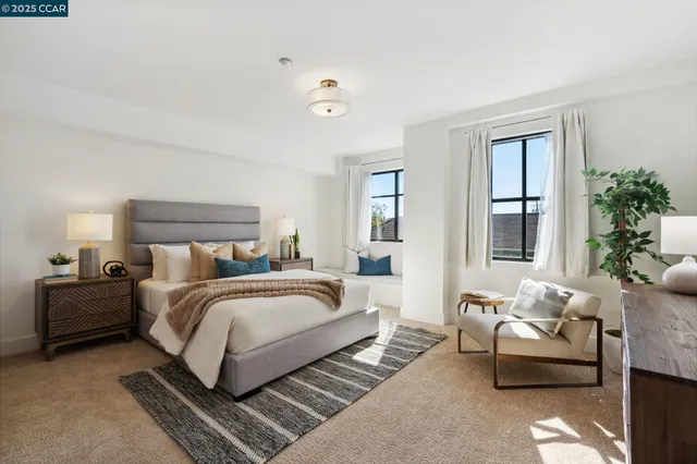 a bedroom with a bed and a couch