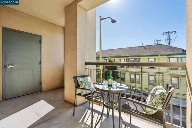 a patio with a table and chairs