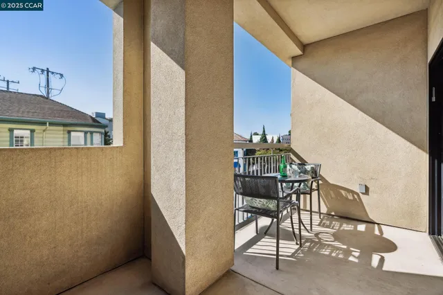 a view of balcony with furniture