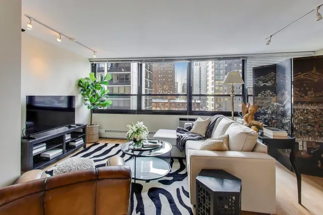 a backyard of a house with seating space