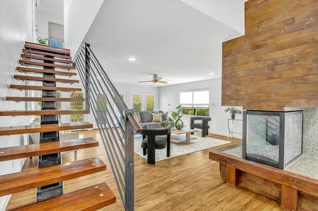 a bathroom with a sink a mirror and a toilet