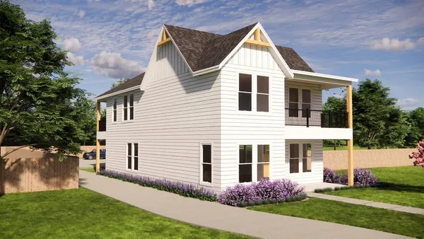 front view of a house with a yard