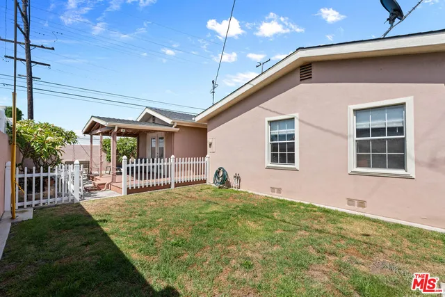 a house view with a garden space