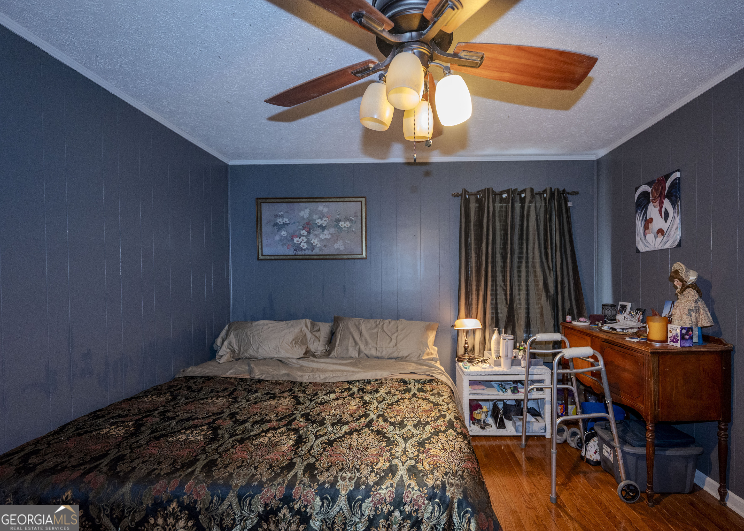 213 Ricefield Road Hartwell, GA 30643 - Photo 11 of 18 a bedroom with a bed and a chandelier