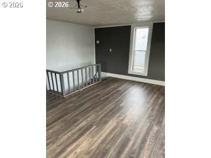 1908 Adams Avenue La Grande, OR 97850 - Photo 10 of 12 a view of a hallway with wooden floor