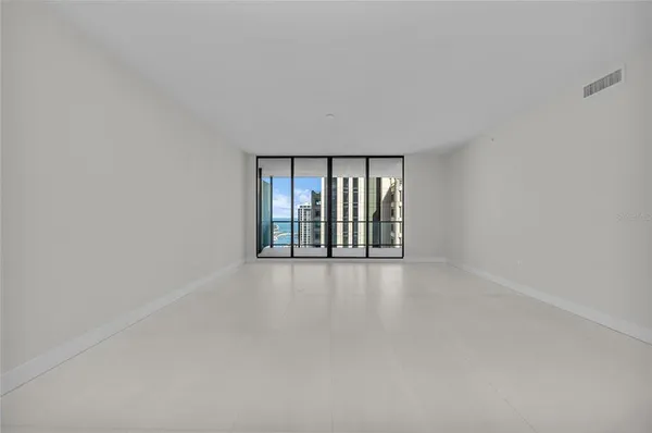 a kitchen with stainless steel appliances a sink stove and cabinets