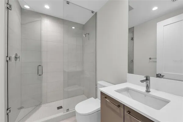 a workspace with furniture and potted plant