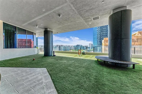 a room with pool table table tennis and stairs
