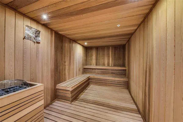 a view of a dining room with furniture wooden floor and chandelier