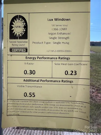 a view of a backyard with a sitting area