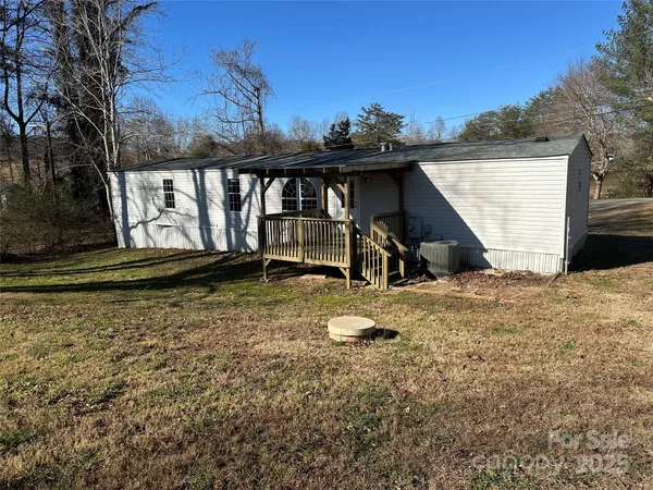 a kitchen with wooden floors and a stove