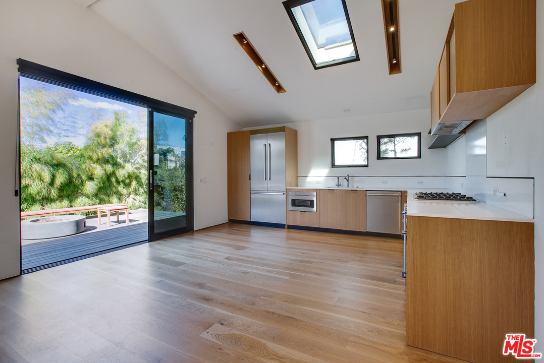 800 7th Avenue Venice, CA 90291 - Photo 7 of 28 a view of a kitchen with a dishwasher and a large window
