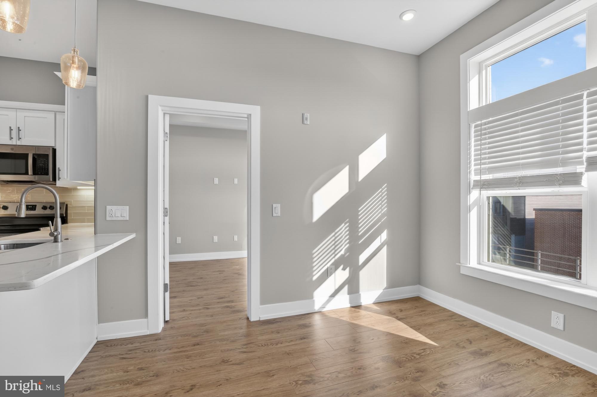 2034 North Front Street, Unit 3 Philadelphia, PA 19122 - Photo 7 of 29 a view of a kitchen cabinets and a window