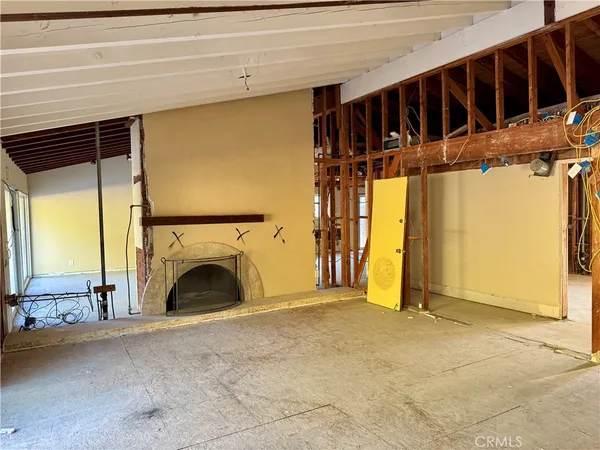 a view of an empty room and window