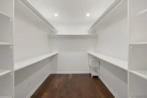 a view of an empty walk in closet