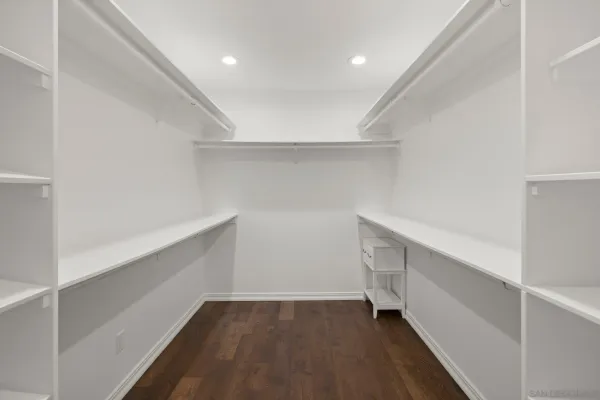 a view of an empty walk in closet