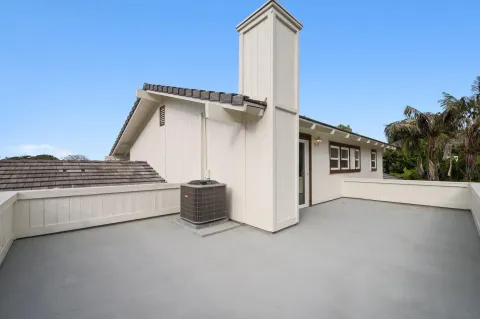 an aerial view of a house with a swimming pool yard and outdoor seating